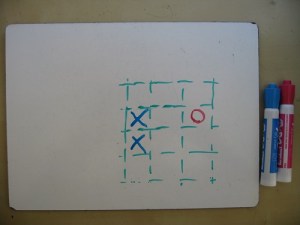 Also a bad move. Should've gone in the lower-left or lower-right corner to win.